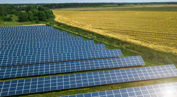 Aerial shot top view of solar panel photovoltaic farm